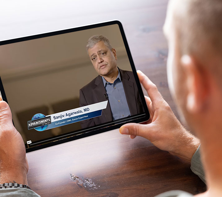 image20 a man watching Sanjiv Agarwala MD on a tablet